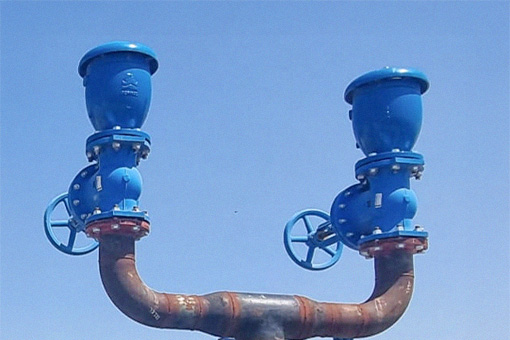 Two BERMAD combination air valves with isolating valves on a pipeline